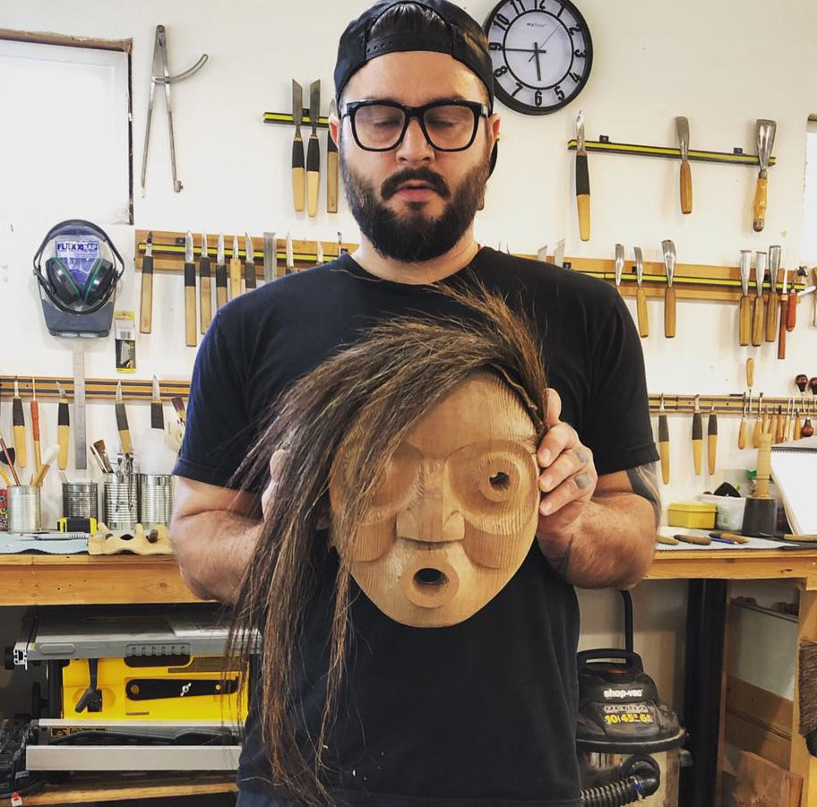 Carver Bracken Hanuse Corlett with mask