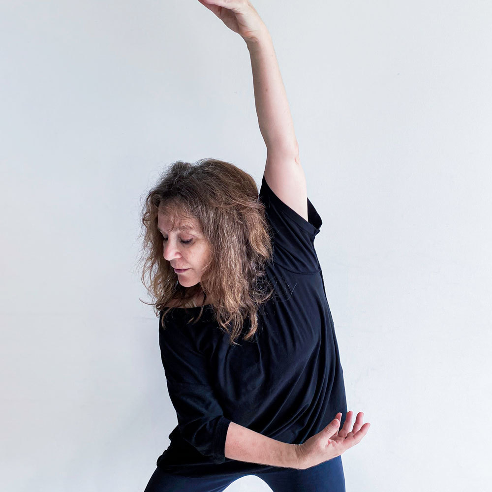 Mary-Louise Albert poses with one arm above her head
