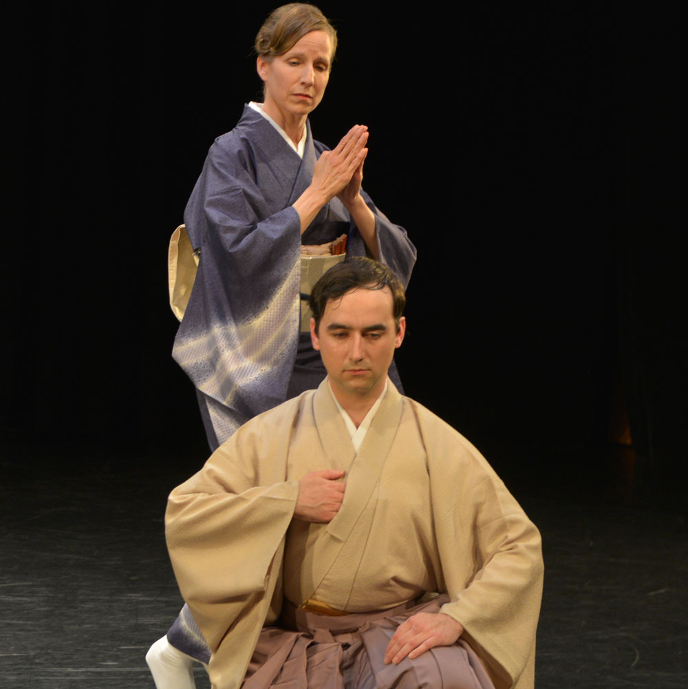 TomoeArts dance artists pose mid performance